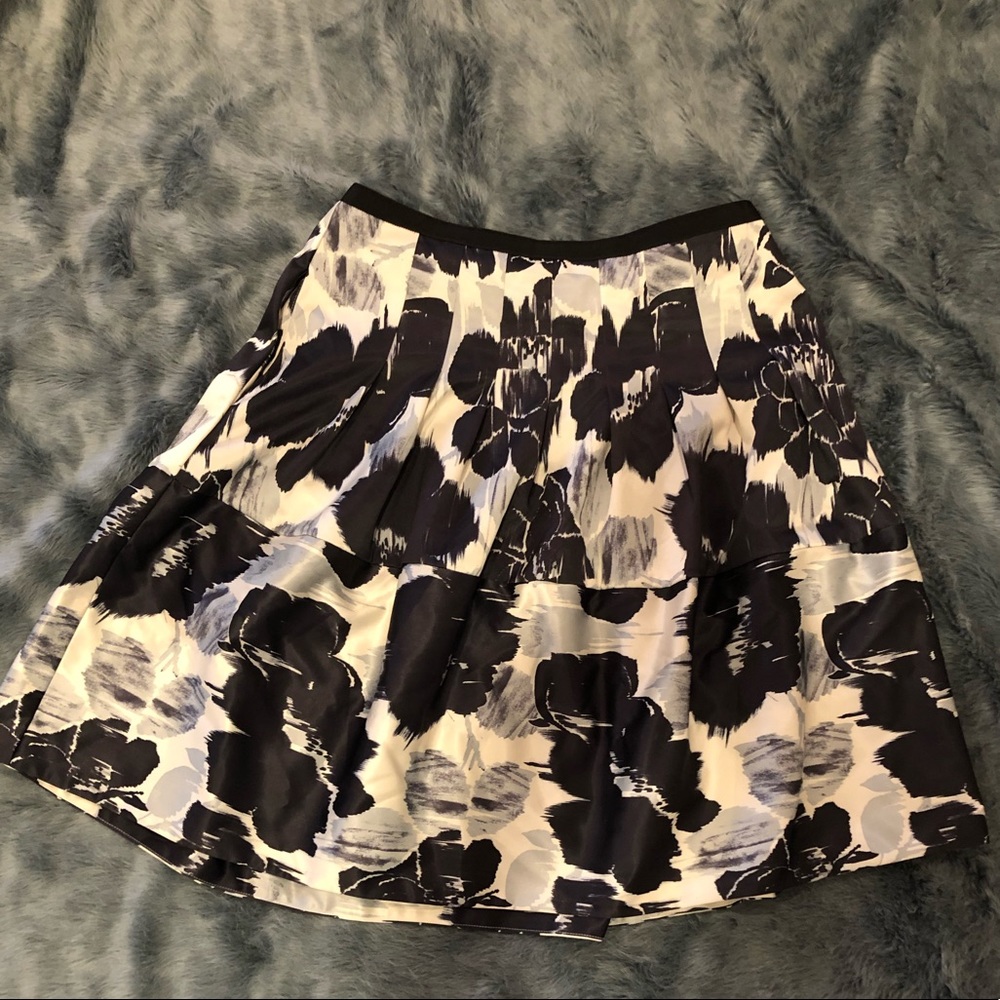 5 for $15. 💙 The Limited skirt with black/blue design